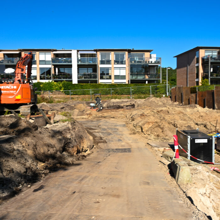 Boliger der ligger lige op til en byggeplades